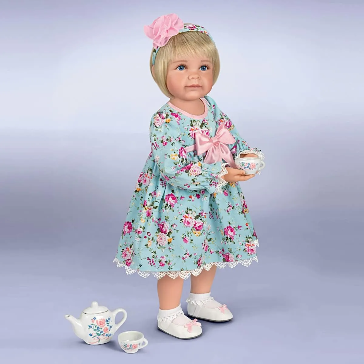 The Ashton-Drake Galleries So Truly Real Tea for Two Toddler Girl Doll Featuring A Finely Tailored Floral Ensemble and Comes with A 3-Piece Porcelain Tea Set and Picnic Blanket